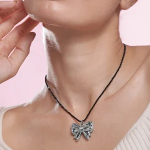 Plated Black Beaded Necklace with Silver Bow Pendant